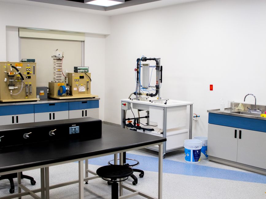 A well-equipped modern laboratory with industrial and healthcare research instruments.