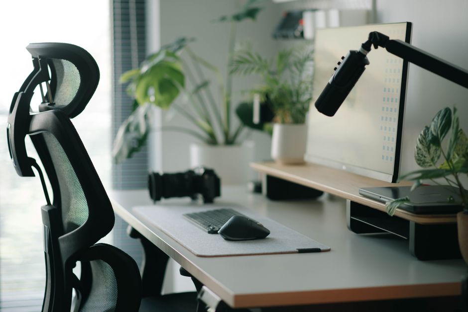 Comparison chart of standard office chair versus adjustable nurse station seating solution with labeled features