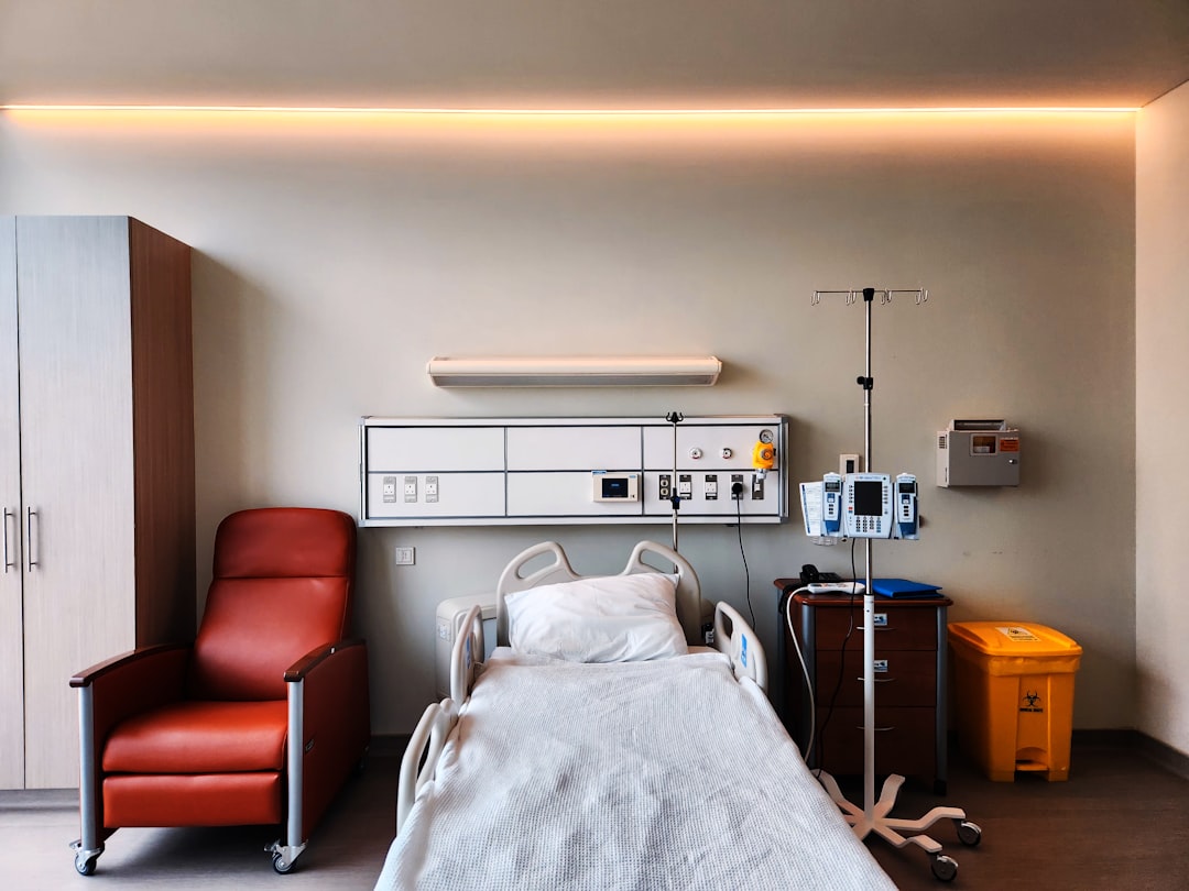 Custom clinical cabinetry with chemical-resistant laminate in a hospital procedure room, including turnkey medical space fit-out