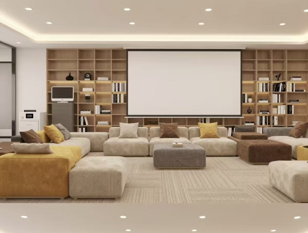 Public leisure area with bookshelf and sofas