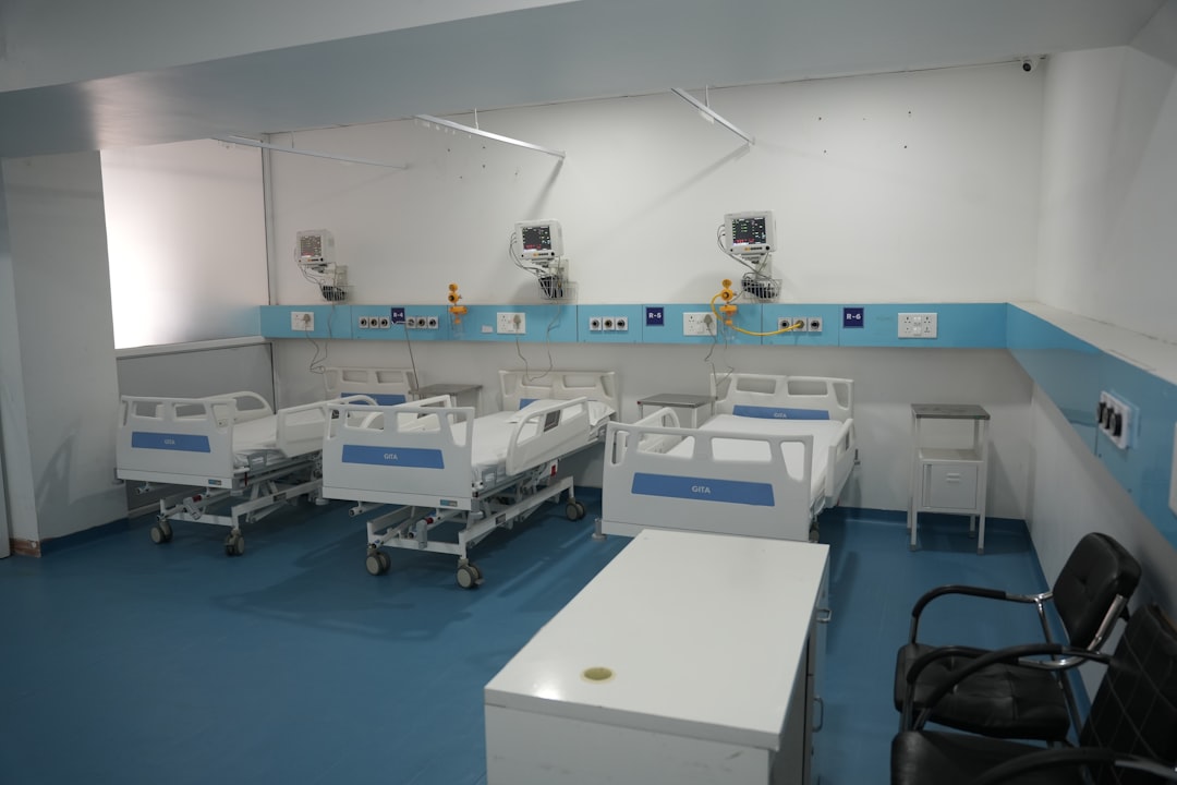 Hospital procurement team reviewing medical furniture compliance documents