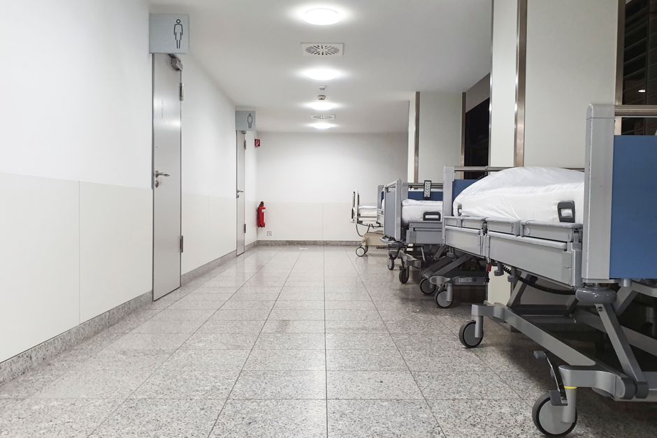 Close-up of high-pressure laminate edge banding on hospital cabinet, cleanable and disinfectable surface