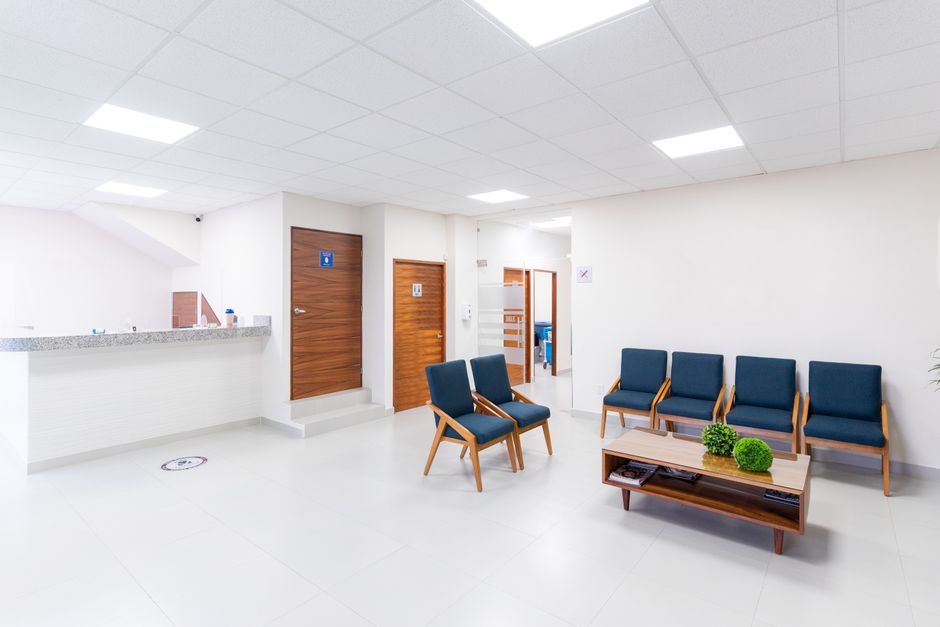 Close-up of hospital waiting room upholstered seating with foam and cover layers exposed during fire safety compliance 2026 inspection